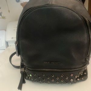Black Michael Kors studded backpack purse